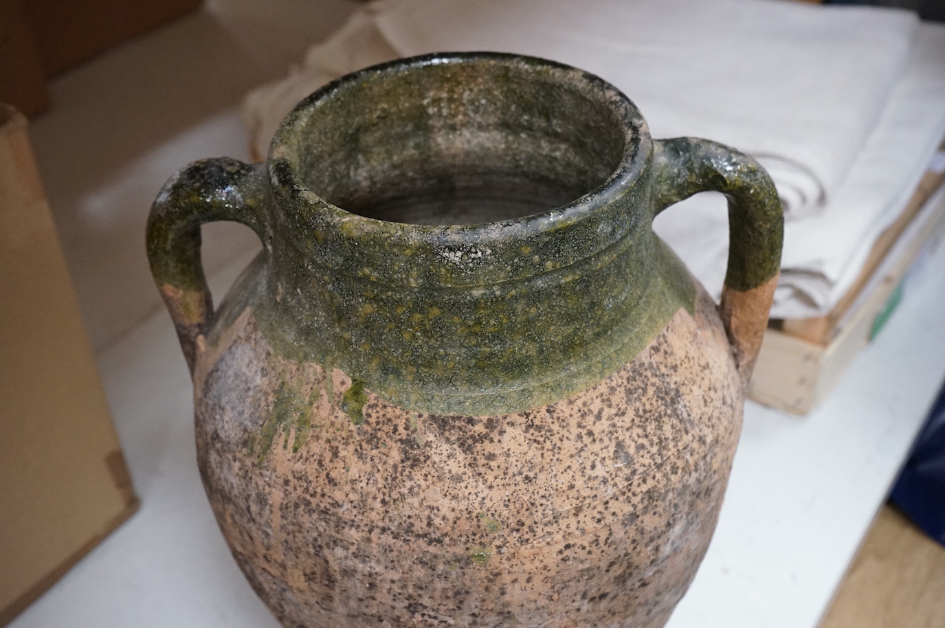 Greek pottery two handled urn, with green glazed stripe, 40cm high.